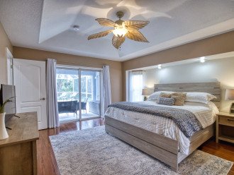 Master bedroom with king bed and ensuite bathroom.