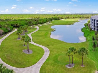 Heritage Landing - Golf, tennis & SPA relax in a luxurious lake facing condo! #22