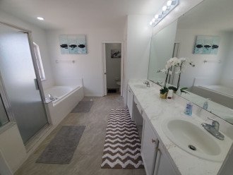 Master bathroom with soaking tub and stand up shower