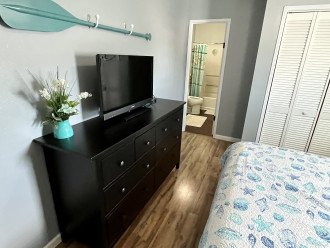 Dresser and TV plus bathroom in master bedroom #2