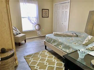 Second bedroom with armoire + closet for storage