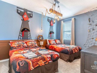 Bedroom 5 is Mickey’s Pirate room w/ two double beds and a fun place to play!