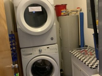 Full size stacked washer and dryer.