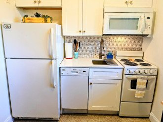Featuring NEW marble backsplash with gold color diamond accents. Darby dishwasher with eco-friendly mode uses only 4.8 gallons per wash cycle.