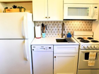 Featuring new marble backsplash with gold color diamond accents. Darby dishwasher with eco-friendly mode uses only 4.8 gallons per wash cycle. The 2 min video tour link sent after booking includes all open cabinets in order to show kitchen supplies.