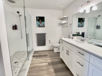 En-suite Master bathroom with over-sized walk-in shower and double vanities