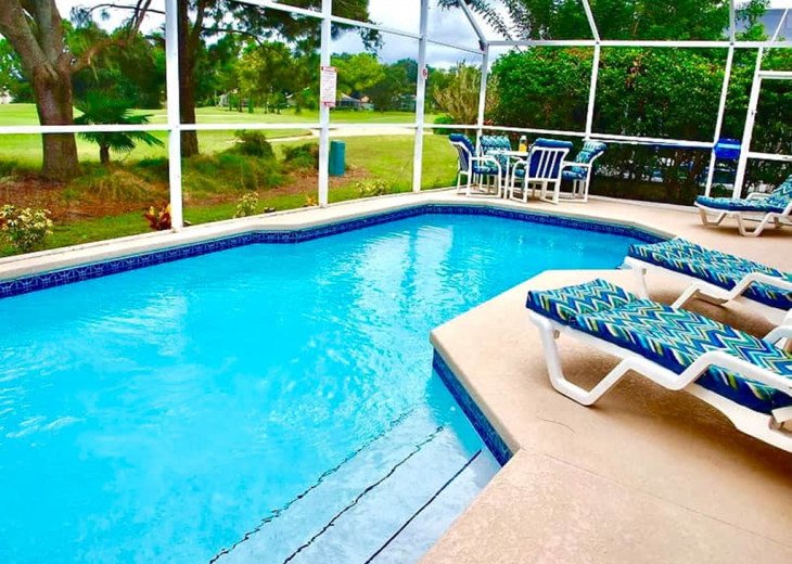 A south facing pool overlooking the golf course