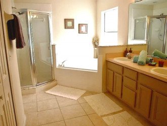 The main bathroom with separate shower and bath
