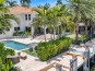 Extravagant Mediterranean coastal waterfront villa is Nestled in the streets of Seven Isles just a mile from the beach.