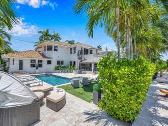 Relish in water front tranquility from the heated pool with its swim shelf and lounge areas.