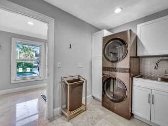 Laundry room with updated washer and dryer