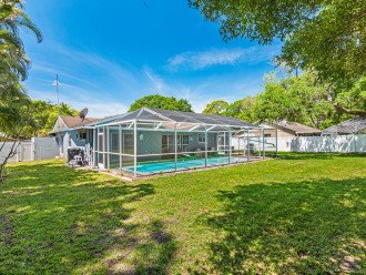 Impeccable fully fenced backyard with a beautiful heated pool, beautiful trees and a grill you could use while creating wonderful memories with your family and friends. If you love what you see, send us an inquiry now!