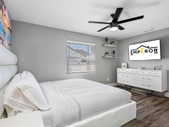 Have the best sleep in this stunning bedroom with a queen sized bed, drawers for storage, and its own TV! Make the most of your stay with us! Inquire about this property now!