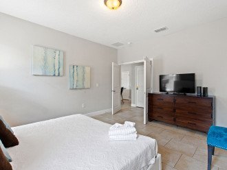 King Bedroom Suite with attached bathroom, large walk in shower dual sinks and garden tub. Direct access to pool and spa deck