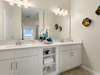 Bathroom with wide mirror