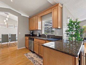 Fully-equipped kitchen with granite counter-top