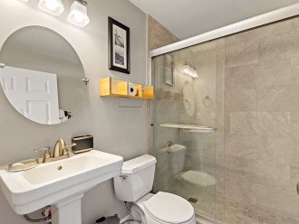 Bathroom with vanity and a walk-in shower