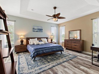 Master King Bedroom Suite with dual aspect windows pool and conservation views.