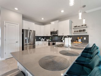 Fully-equipped kitchen with granite counter