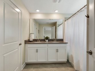 En-suite bathroom with his and hers sink