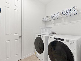 Laundry area with fullsize washers