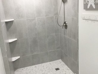 Newly renovated master bathroom with walk-in shower