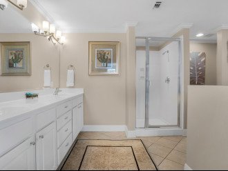 Primary bath with walk in shower and jacuzzi tub