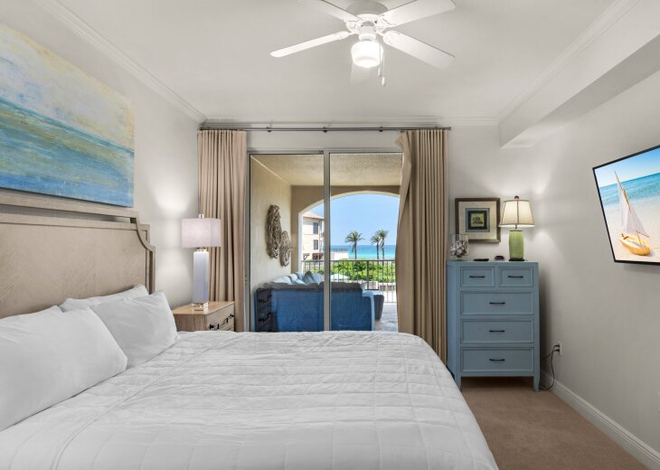 Primary Bedroom with King Bed and Private Balcony Access