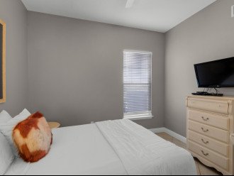 Guest Bedroom with Queen Bed and Flat Screen TV