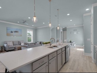 Open kitchen with plenty of counter space for make family meals