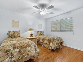 Guest bedroom with two twin size beds.