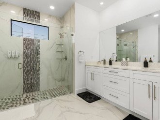 Master bath with dual shower heads and Jack and Jill vanity.