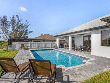 Summer Openings! Large, Heated, South-facing Saltwater Pool Overlooking Canal!