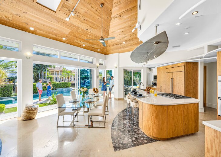 The kitchen has state of the art appliances, plenty of storage space, and excellent views of the pool and the waterway.