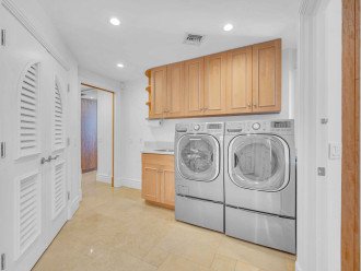 Laundry with brand new washer and dryer