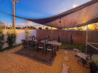 Outdoor dining area with grill