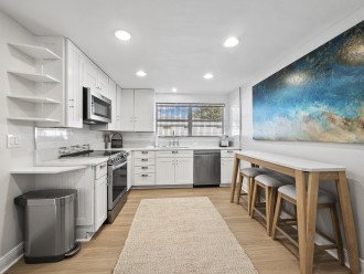 Eat in kitchen with new appliances and pantry