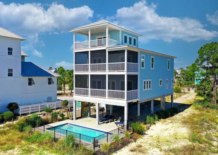 Private pool and screened in porches so you can enjoy the amazing water views. 