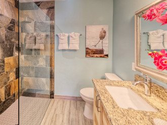 Master Bathroom of Pelican Suite with Walk-in Shower at AMI Beach Lagoon