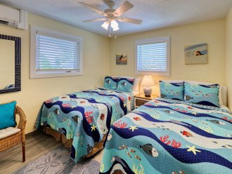Bedroom (2 Fullsize Beds) of Pelican Suite at AMI Beach Lagoon