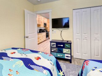 Bedroom of Pelican Suite at AMI Beach Lagoon