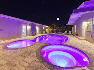 Full Moon over large Heated Salt Water Pool and Spa at AMI Beach Lagoon