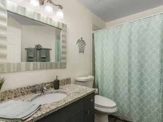 Second full bathroom with bathtub/shower.