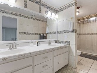 master bathroom with his and her sinks