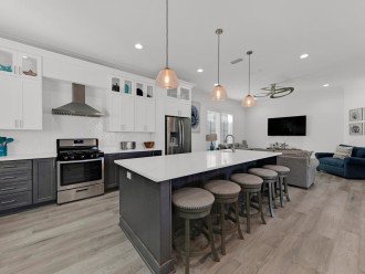This Huge Kitchen Island Is Perfect For Gathering the Whole Family.