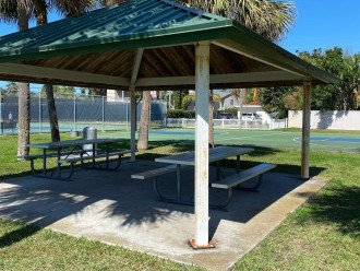 Public picnic area by the kids playground and courts
