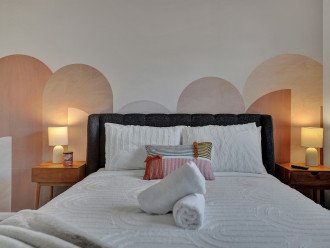 Arches Bedroom - Queen size hotel grade mattress, side tables with smart plugs