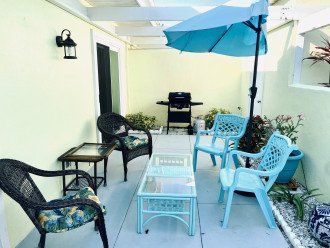 Bright front patio, with barbq