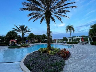 Community Amenities: Lounge around on the lawn chairs or grab a table with umbrella and chairs for lunch with the family. Gorgeous zero entry (no steps) resort pool. Usually open 7am-7pm and available to registered guests.