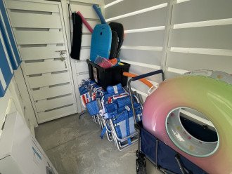 Storage area with beach chairs and floats